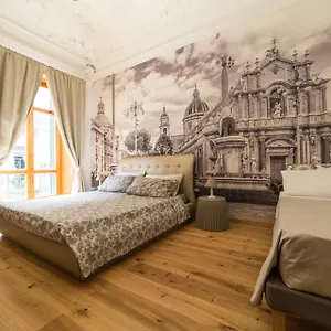 https://umberto-flat-city-center.taorminaitalyhotels.com